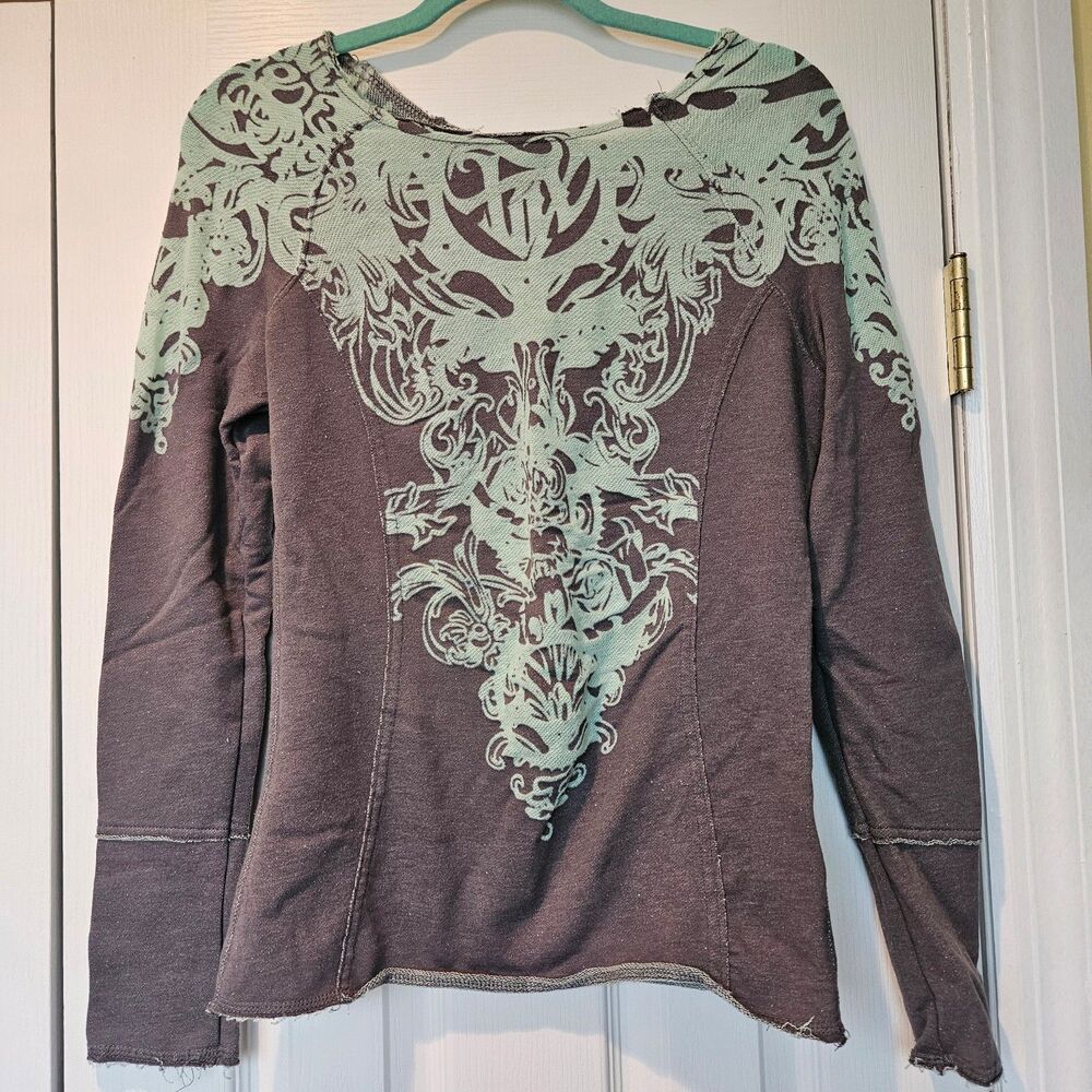Fox off-the-shoulder raw hem sweatshirt.